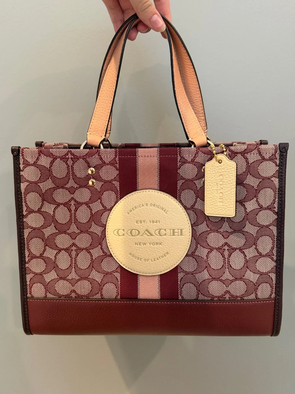 Coach Dempsey Carryall handbag in burgundy (NEVER USED)